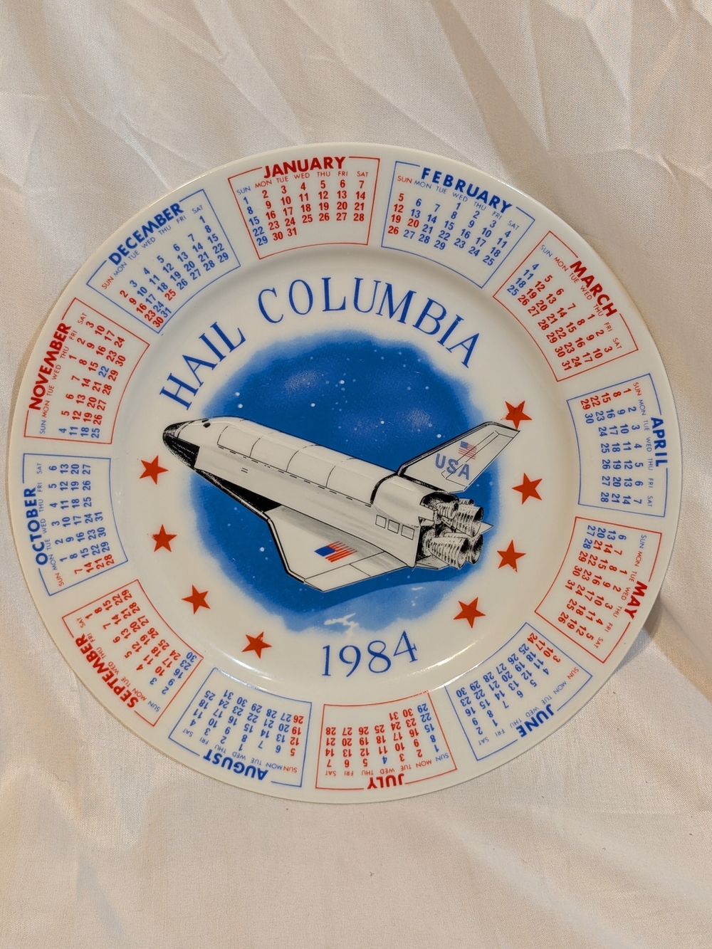 Hail Columbia 1984 Decorative Space Shuttle Calendar Plate - White/Blue